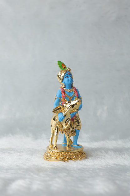 Gold plated Krishana with calf blue Colour