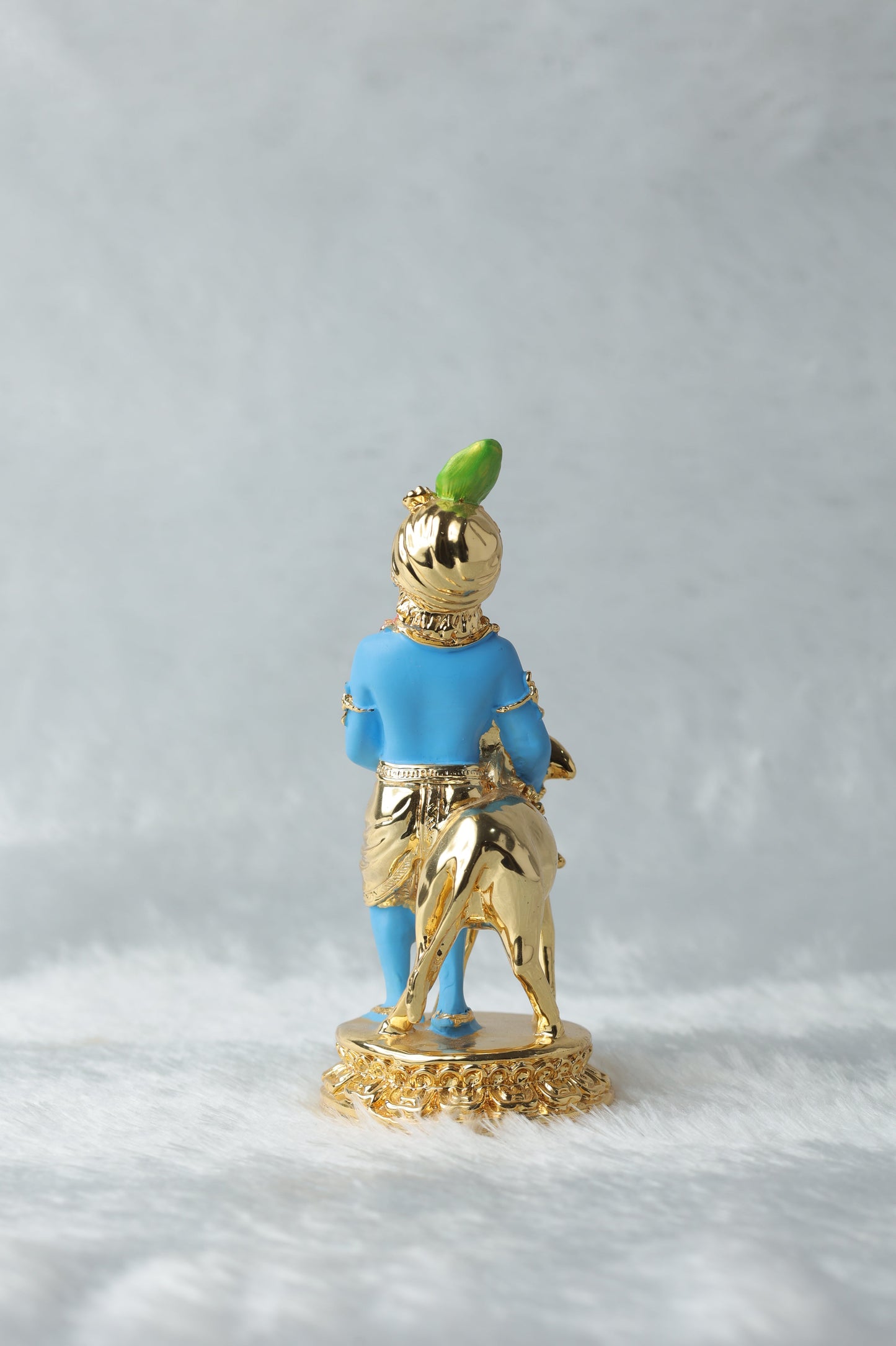 Gold plated Krishana with calf blue Colour